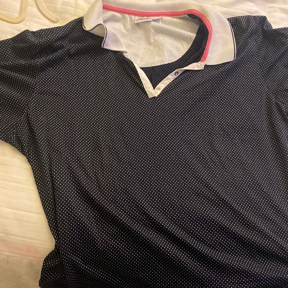 Tail XL women’s black and white polo shirt with a pink color